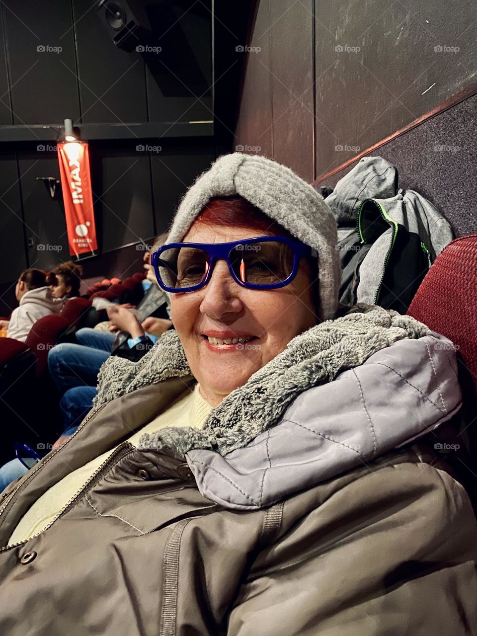My mom for the first time in IMAX, watching Avatar 2