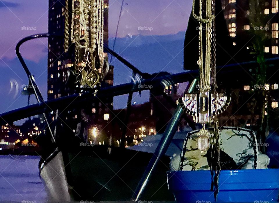 The later the hour the more deep purple the sky turns at “Newtown Creek” in LIC, Queens. The nighttime illumination of the “Greenpoint”, Bklyn high rises sparkles and shimmers even more when reflected by the “East River”. 2024. Hypnotic Productions