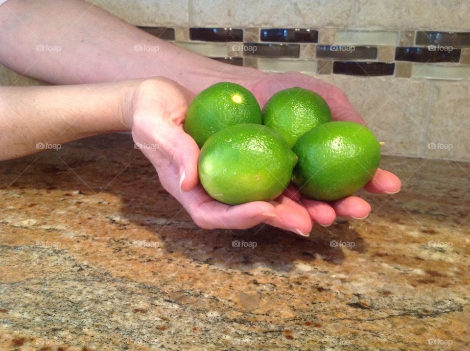 A handful of delicious limes.