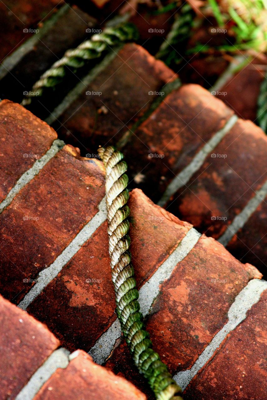 rope on brick stairs.