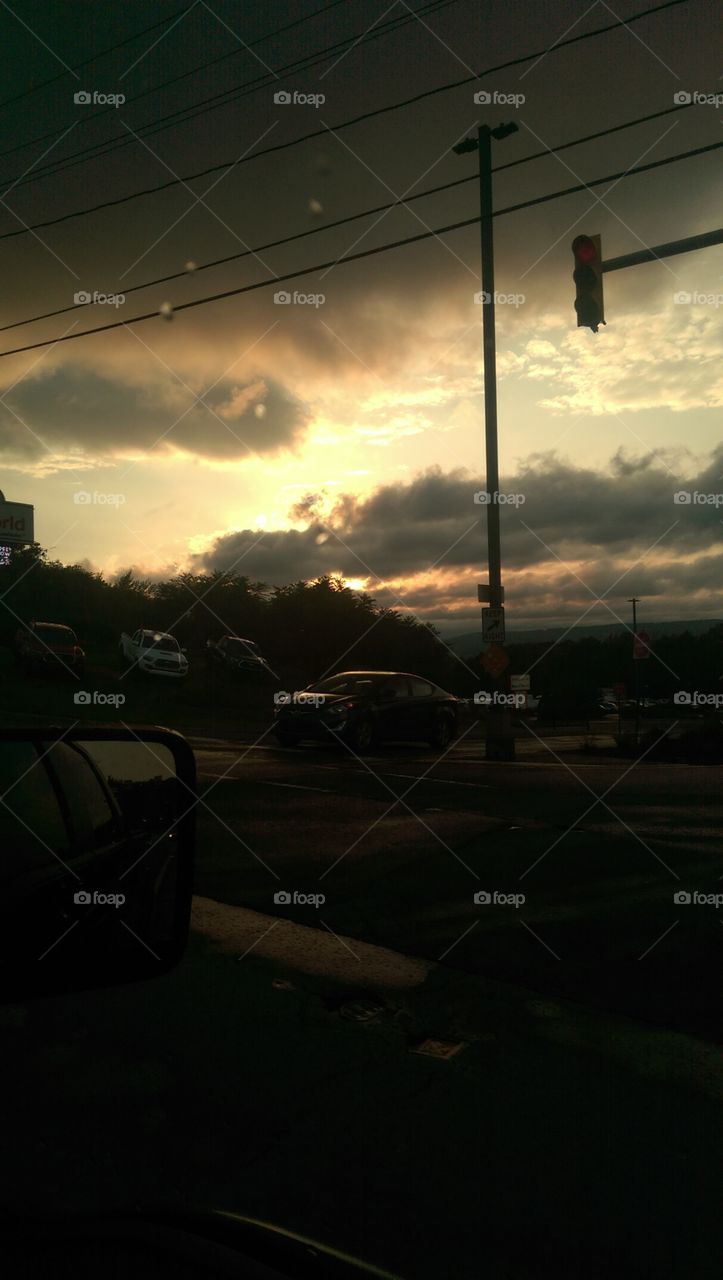 Looking out the window.