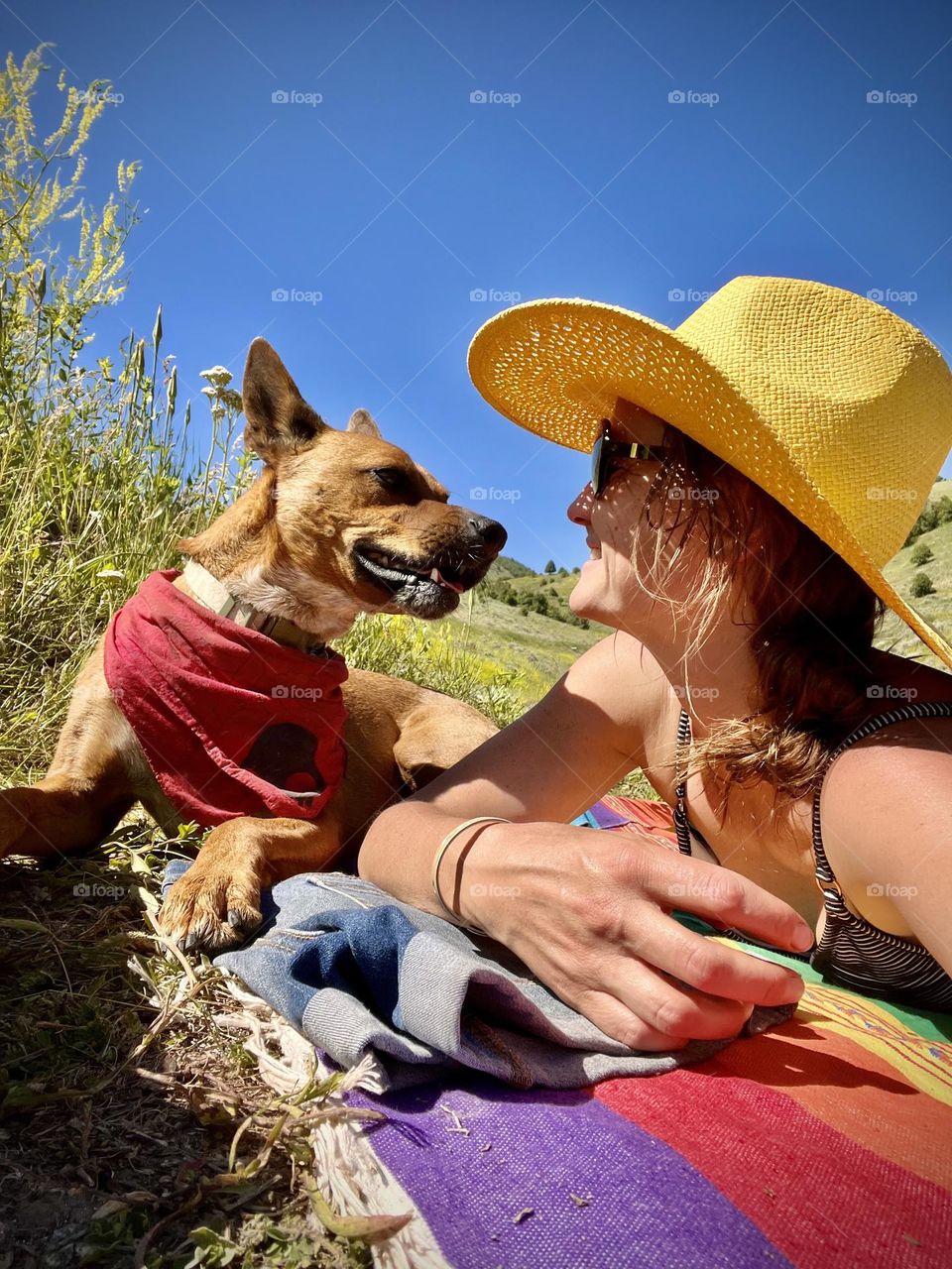 Self-taken expression of the love between my dog and me, enjoyed on a summer day at the lake in Utah 