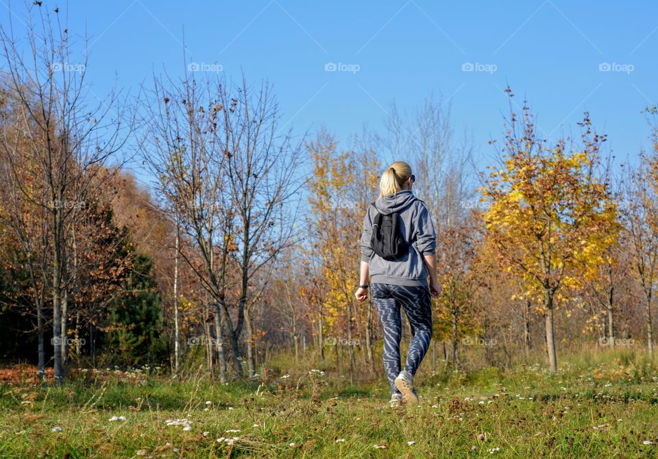morning walking woman in autumn time