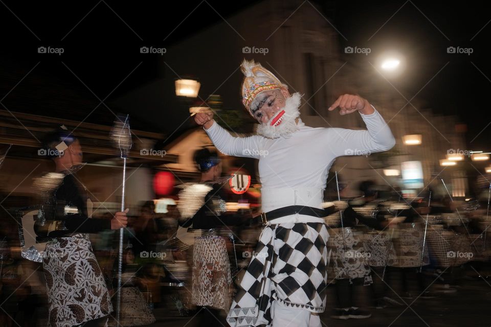 A boy wearing Hanuman costume in night costume festival