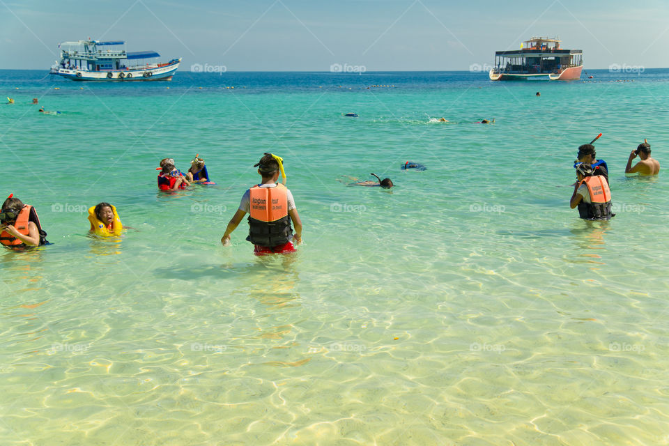 Snorkling activity. people snorkling on an island