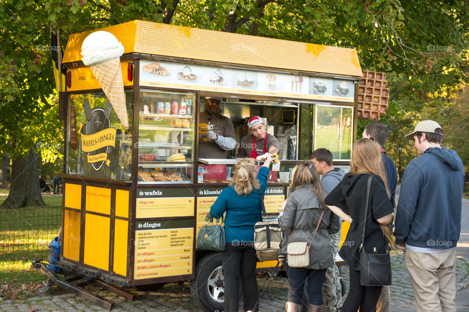 yellow waffle truck. in central park in new York