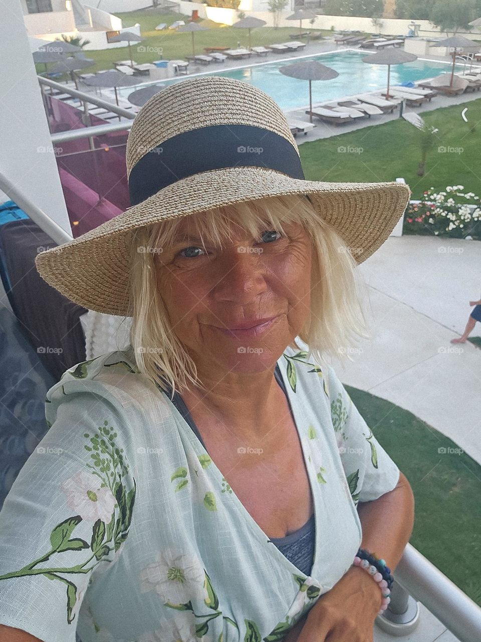 Middle age woman in Rhodos a summerday.  
tan and beautiful ❤️🧡💛💚💙💜