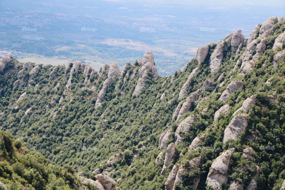 Mountain with woods and rocky formations all made by Mother Nature 