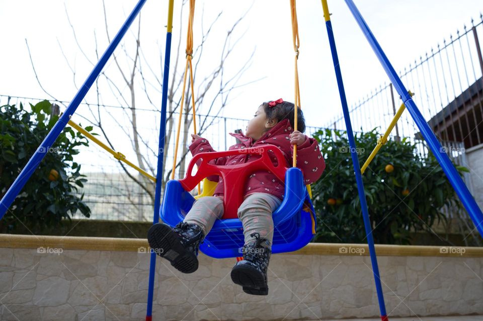 playing on the swing