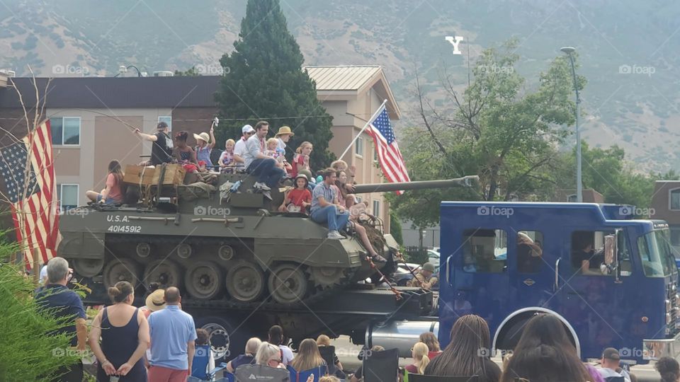 Tank at the parade with the BYU 'Y' on the mountain