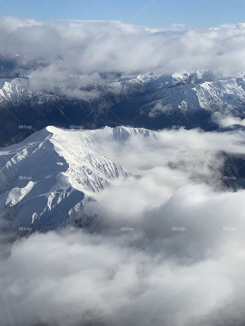 This was taken from the plane I was flying with that was about to land on Queenstown International airport last July. The alps in the South Island of New Zealand get a lot of snow in winter.