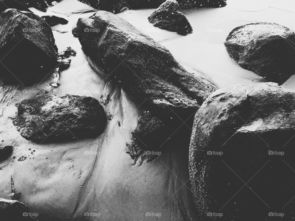 Rocks on a sandy beach