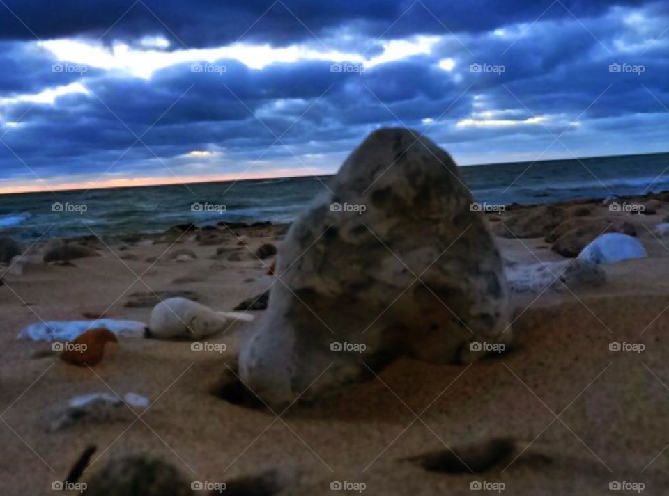 Tiny rocky mountain. Rocks on the beach in Smidstrup Strand, northern Sealand, Denmark, spring 2015