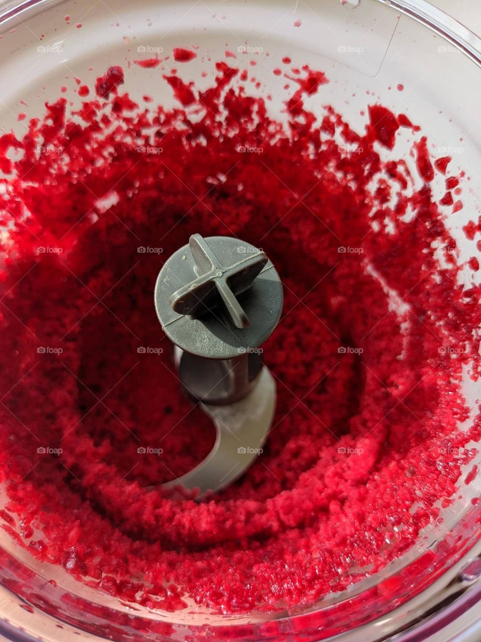 Crushing cherries in a blender