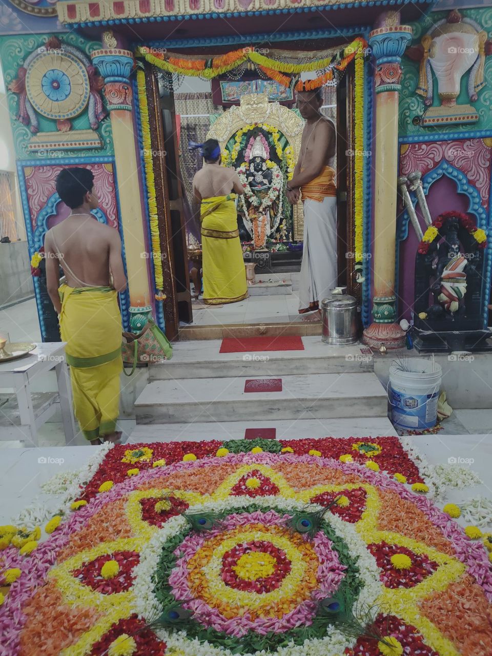 Indian traditional culture with different colours of flowers decoration for the Lord krishna
