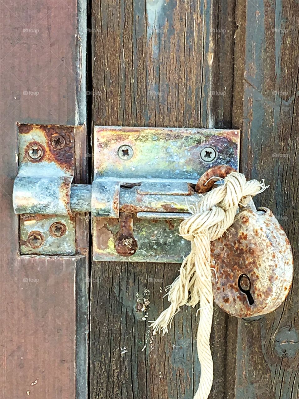 Lock it with metal and rope 