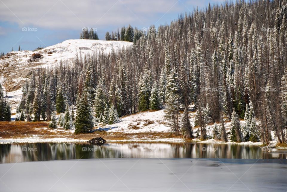 Reflections From a High Mountain Lake in the Snowy Range