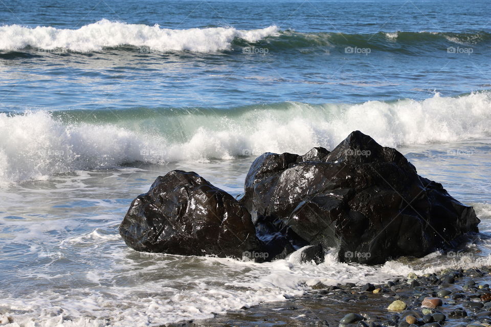 Big waves crashing on the rocks 