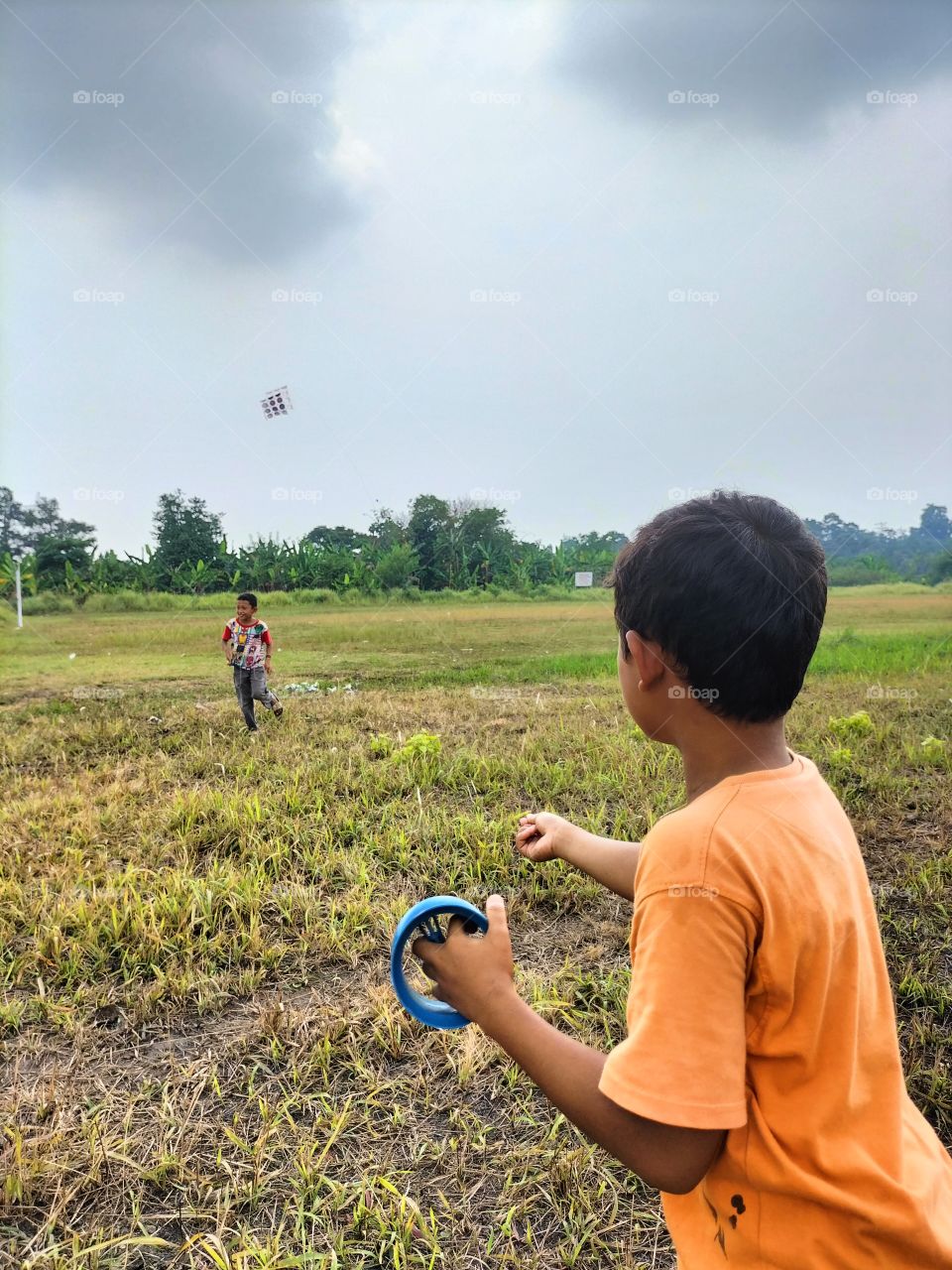 A child playing kite