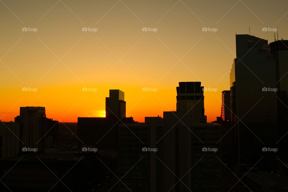 Silhouette of building during sunset