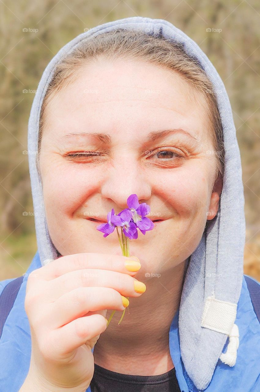 Purple spring flowers in my hands