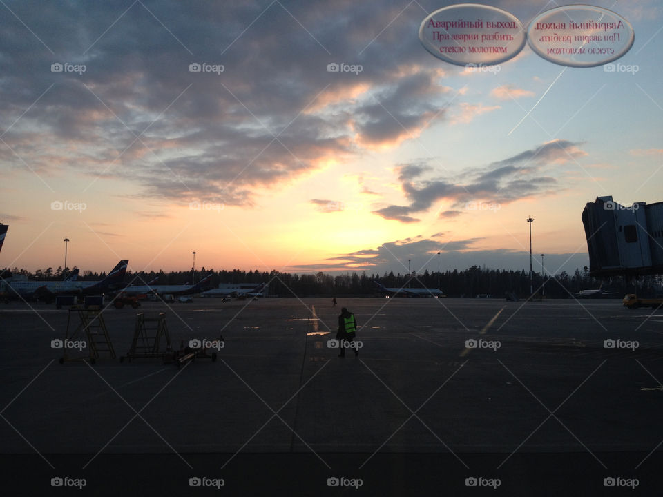 Sunset over the airport landing strip