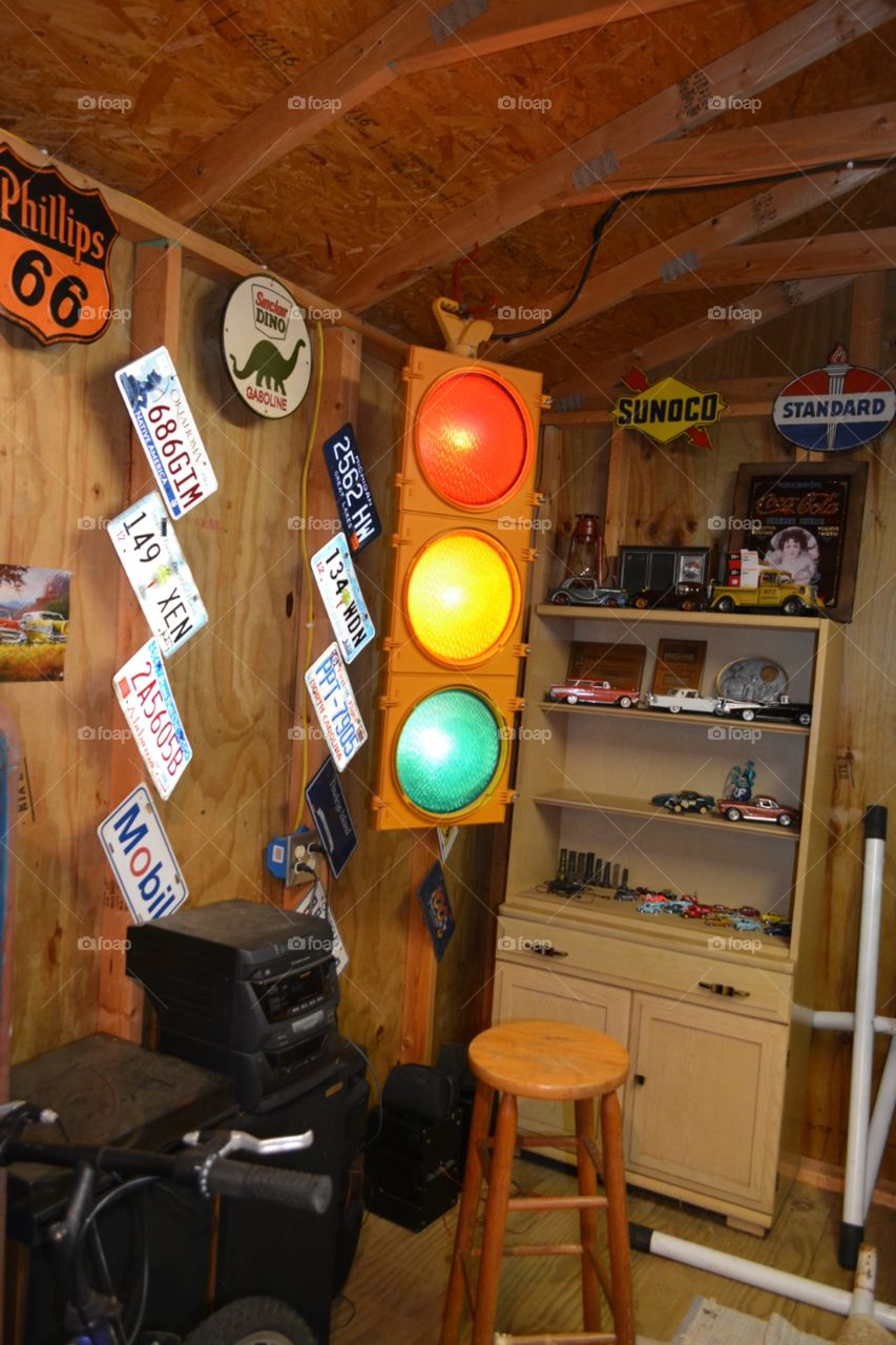 Man Cave Workshop with Street Light, Collectable Cars, License Plates, Tin Signs