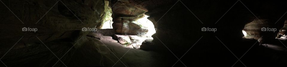 Rock cave with natural windows Hocking Hills 