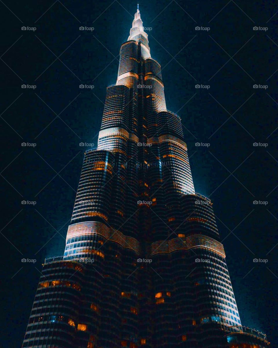 The Burj Khalifa known as the Burj Dubai prior to its inauguration in 2010, is a skyscraper in Dubai, UAE. With a total height of 829.8 and a roof height of 828 m the Burj Khalifa has been the tallest structure and building in the world.