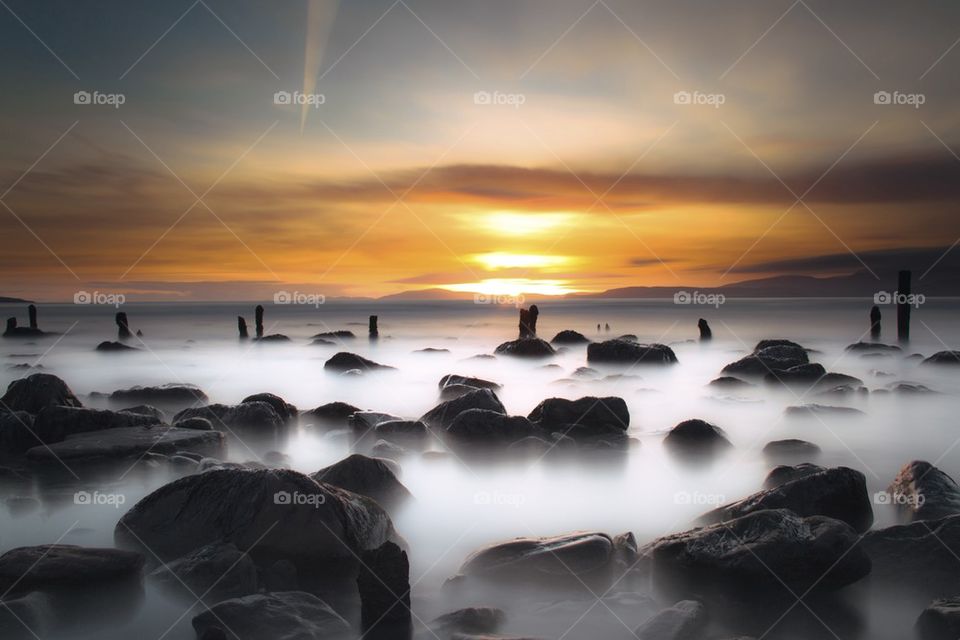 Scenic view of beach during sunset