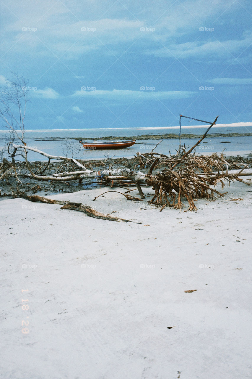 Barquinho e areia