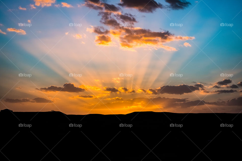 Beautiful beam of Sunset over desert