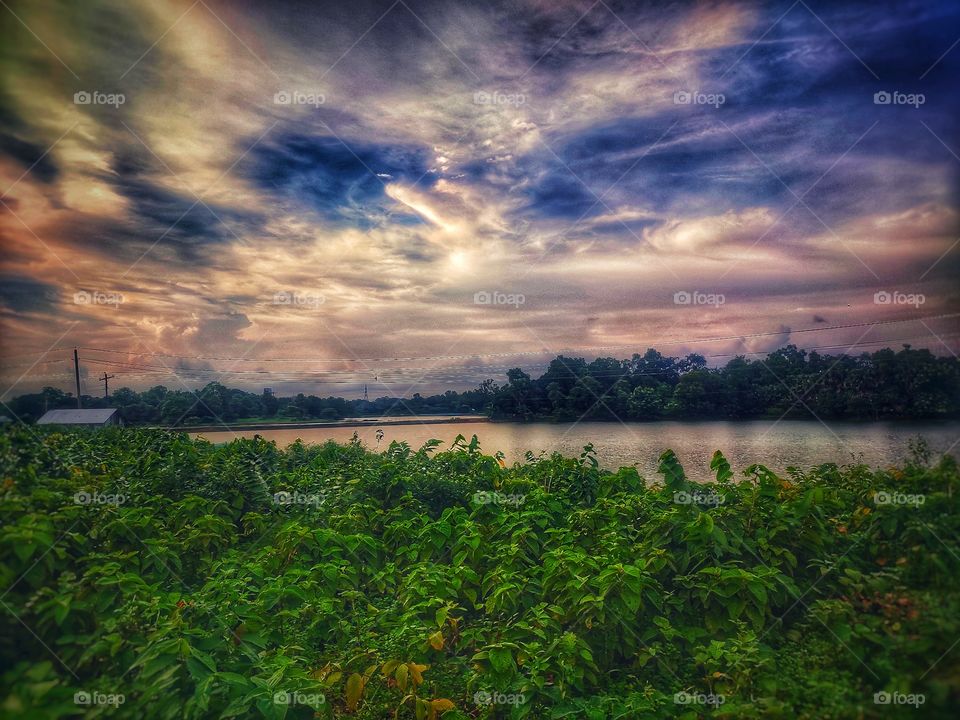 This sky look like he wants some thing to this world. 
Ever green/blue sky/ place is awesome.