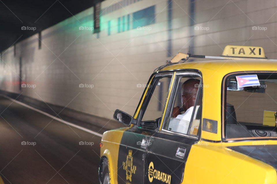 Cuban taxi in underpass 