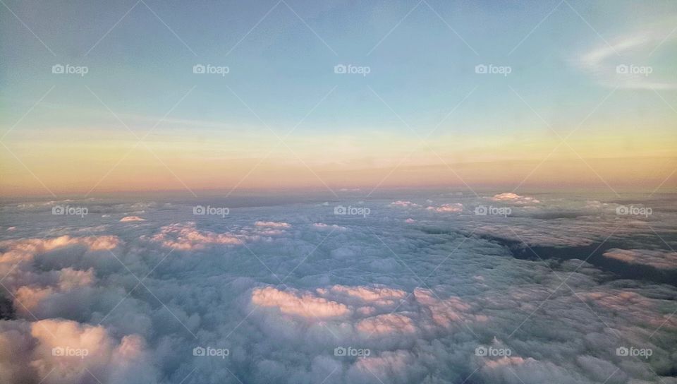 Beautiful blue sky, white clouds, rainbow skies. Heaven’s beauty, summer time, sunlight and nature above.