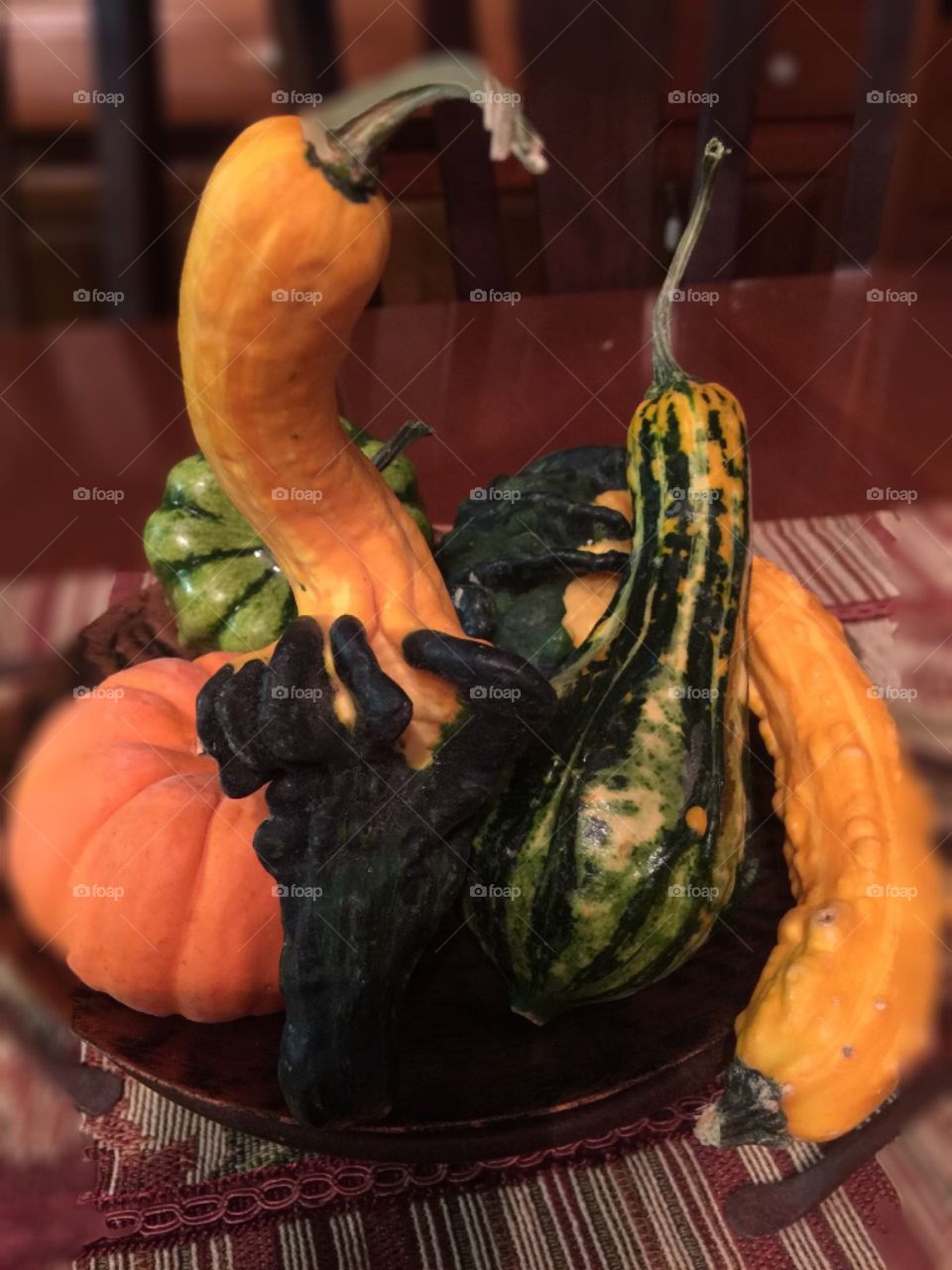 The Gourds of Fall. Couldn't help but note two of the Gourds appear to be grasped by monster hands! What do you think?