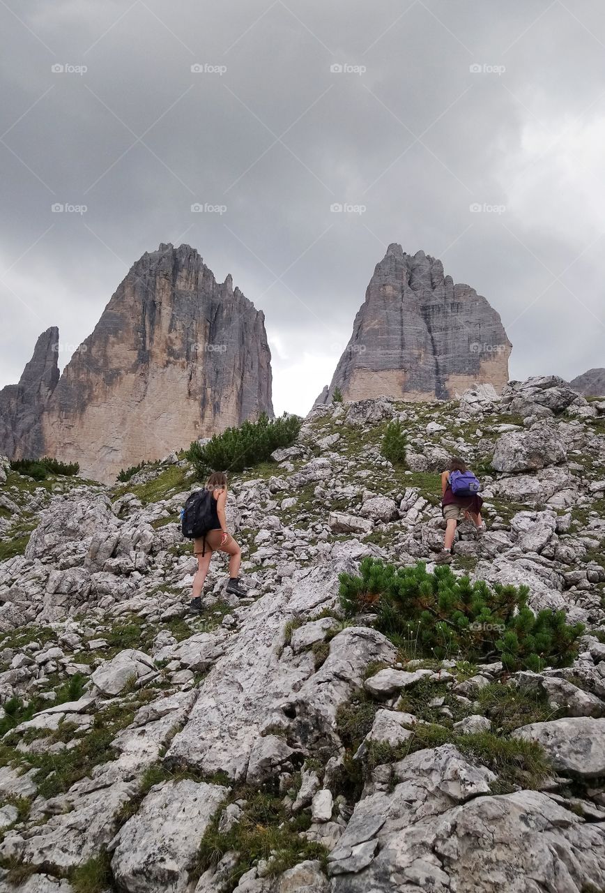 Girls hiking, Dolomites, Italy
