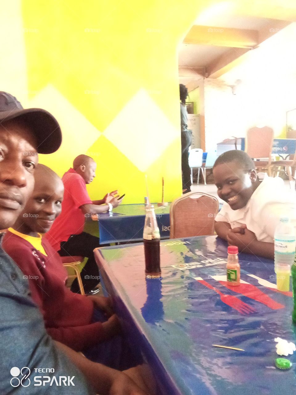 having lunch in a hotel with my daughters after picking them from school in Isingiro district Western Uganda Africa.