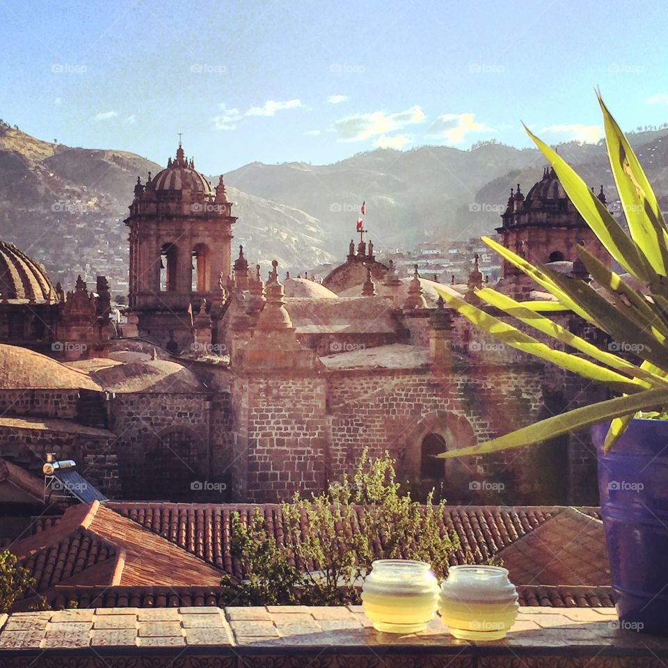 Pisco Sours overlooking Catedral Basilica de la Virgen de la Asuncion in Plaza de Armas Cusco