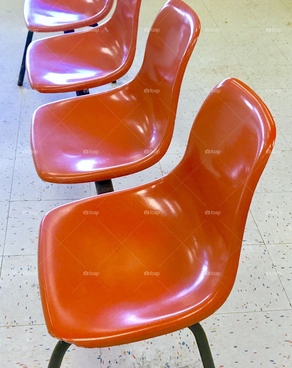 Close-Up Plastic Orange Chairs