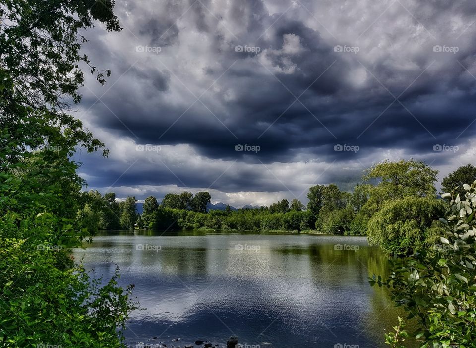 Storm clouds over a lake.