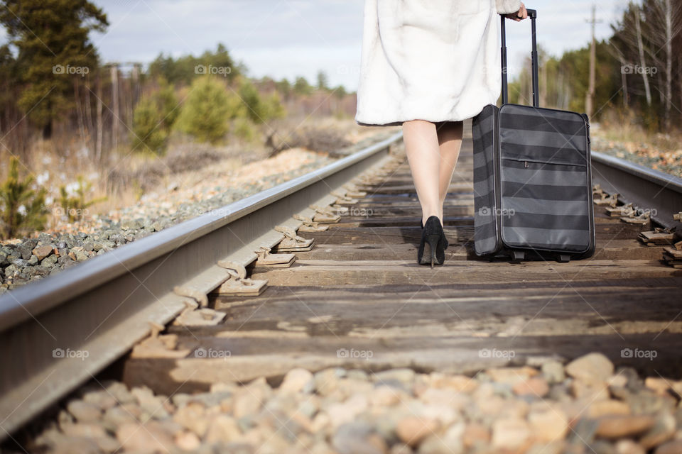 girl goes on railway