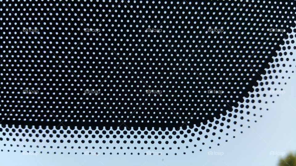 Pattern of black with varied dots