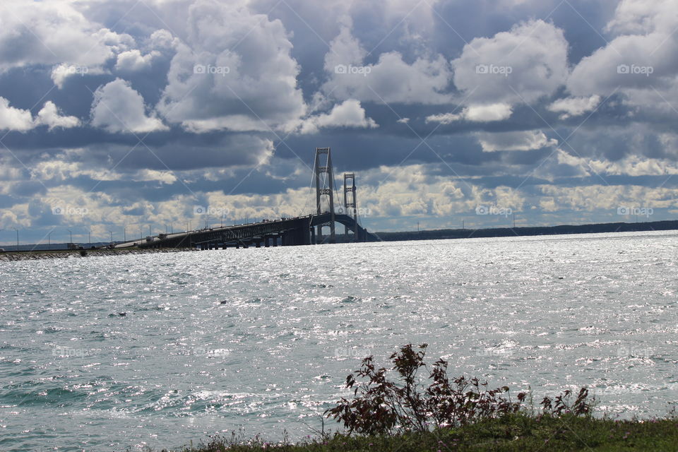 dramatic skies competing with the Mackinaw bridge