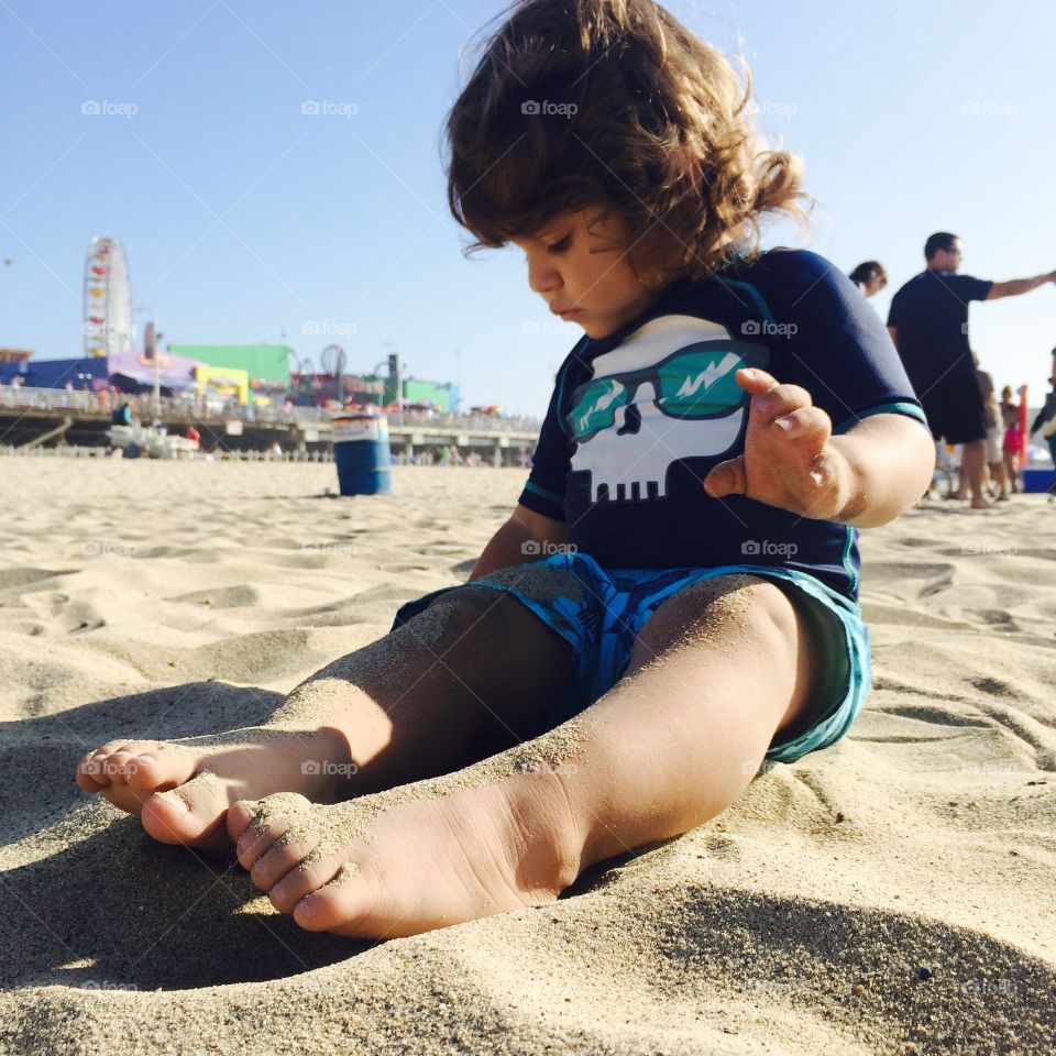 Sand toes. Loving that sand more than the water 