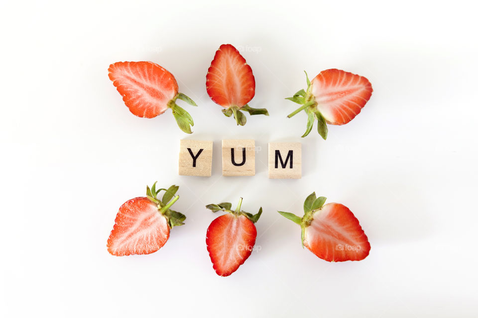 Delicious fresh strawberries cut in half