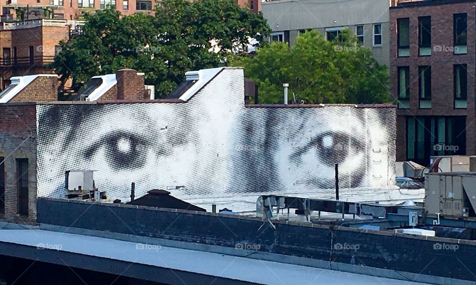 Painted on the side of a building viewed from the Highline