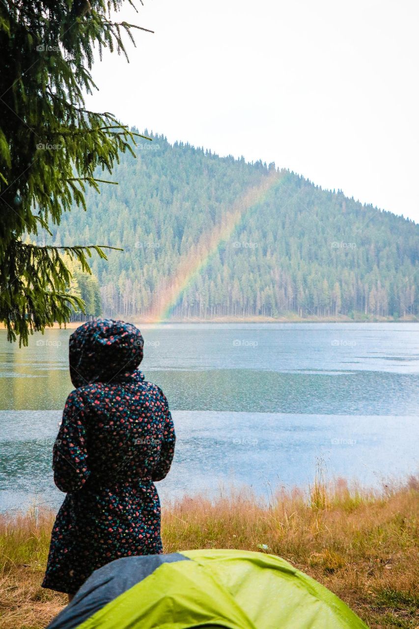 Picture this: it is mid summer, we're camping in the forest, next thing you know it starts raining cats and dogs, 30 minutes later, the sun comes out and so the rainbow.
it was quite the experience for all of us to see a rainbow forming on the lake.