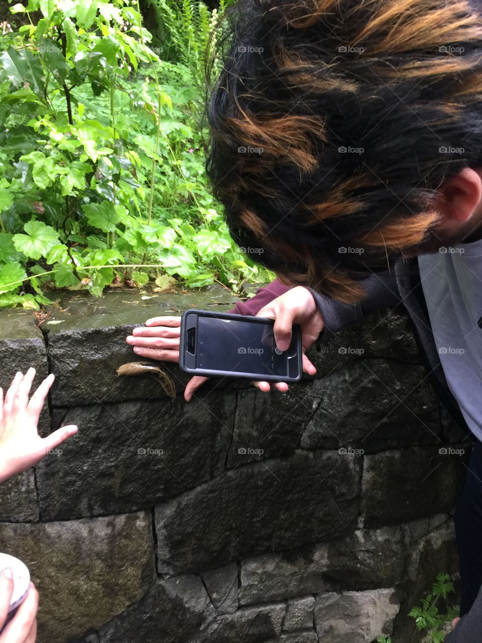 Enjoying nature admiring a slug
