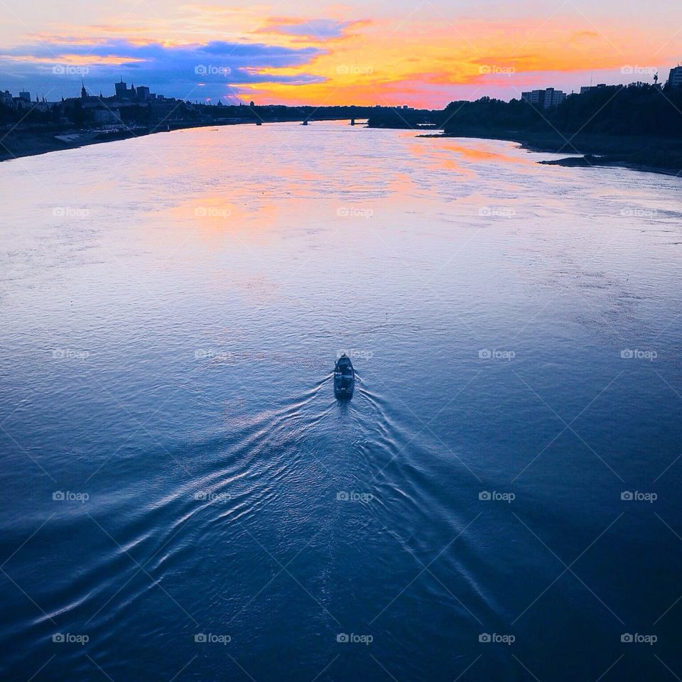 Sailing on Warsaw river . Boat sailing on river in Warsaw 